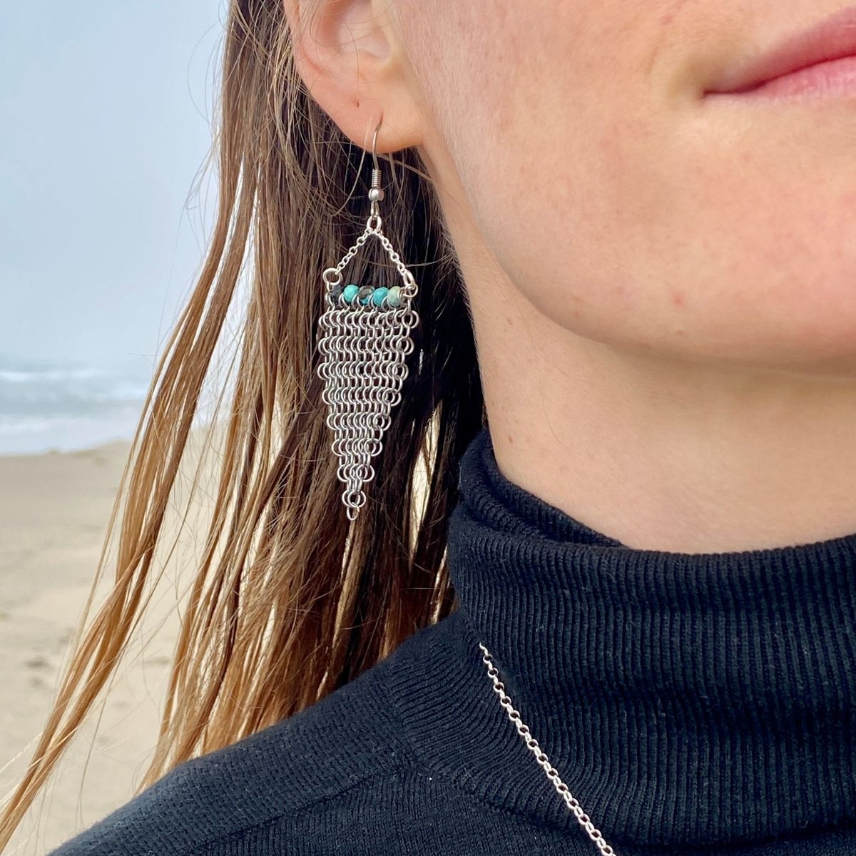 Repurposed Shark Chainmail Suit and Turquoise beads mixed with silver. Hanging on up-cycled aged earring hooks. for a more rustic and adventurous look. 