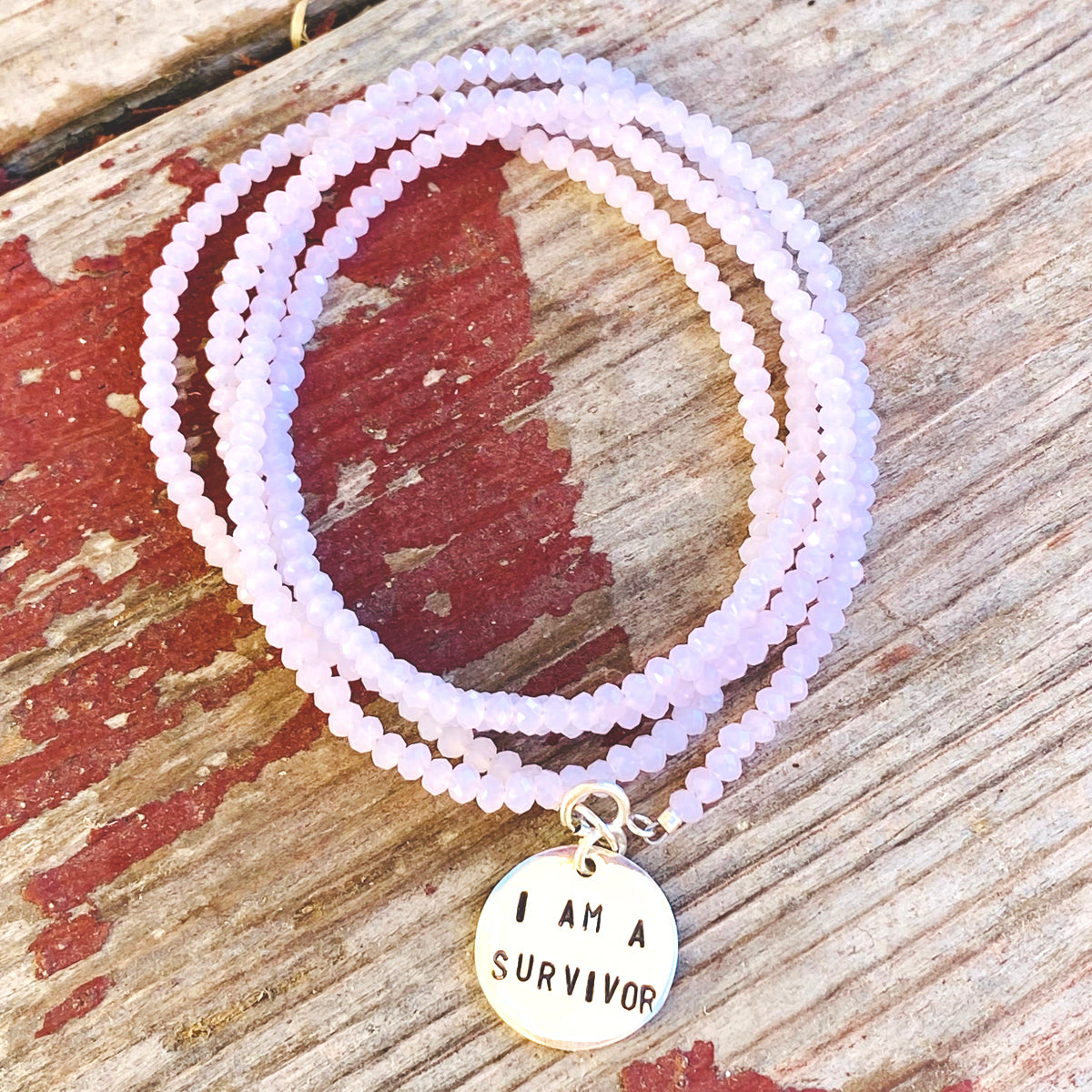 I am a Survivor- Affirmation Bracelet with Rose Quartz. I am a survivor, not a victim. 
