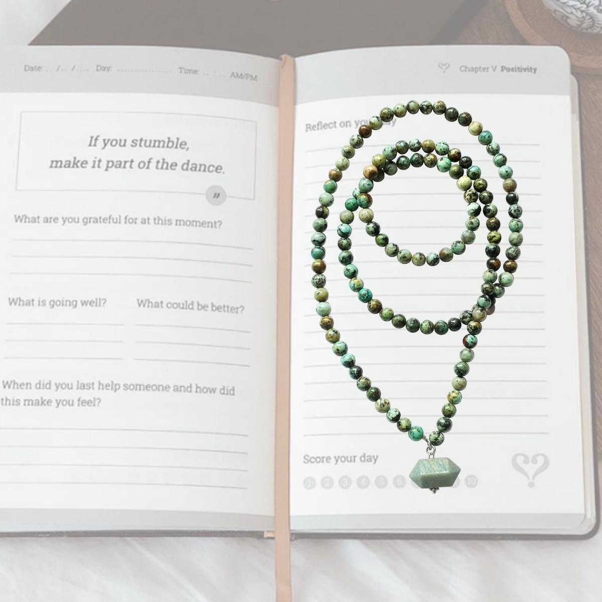 Journal now with the #1 best-selling guided journal and experience a breakthrough in relationships, your mental well-being and an increased sense of togetherness and belonging in the world.  Work on your gratitude journal while wearing the African Turquoise Necklace!