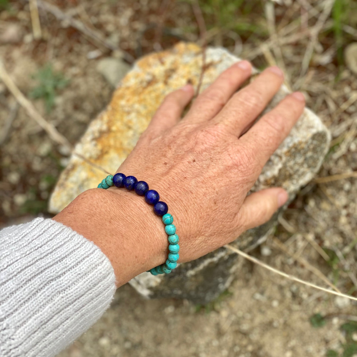 Ocean Planet - Blue Marble Gratitude Bracelet with Lapis Lazuli Earth Symbol Pendant on a Turquoise Howlite Mala Bracelet. "You are not a drop in the ocean, you are the entire ocean in a drop." – Rumi Lapis Lazuli is known as the water stone, so you can easily assume its elemental affinity. 