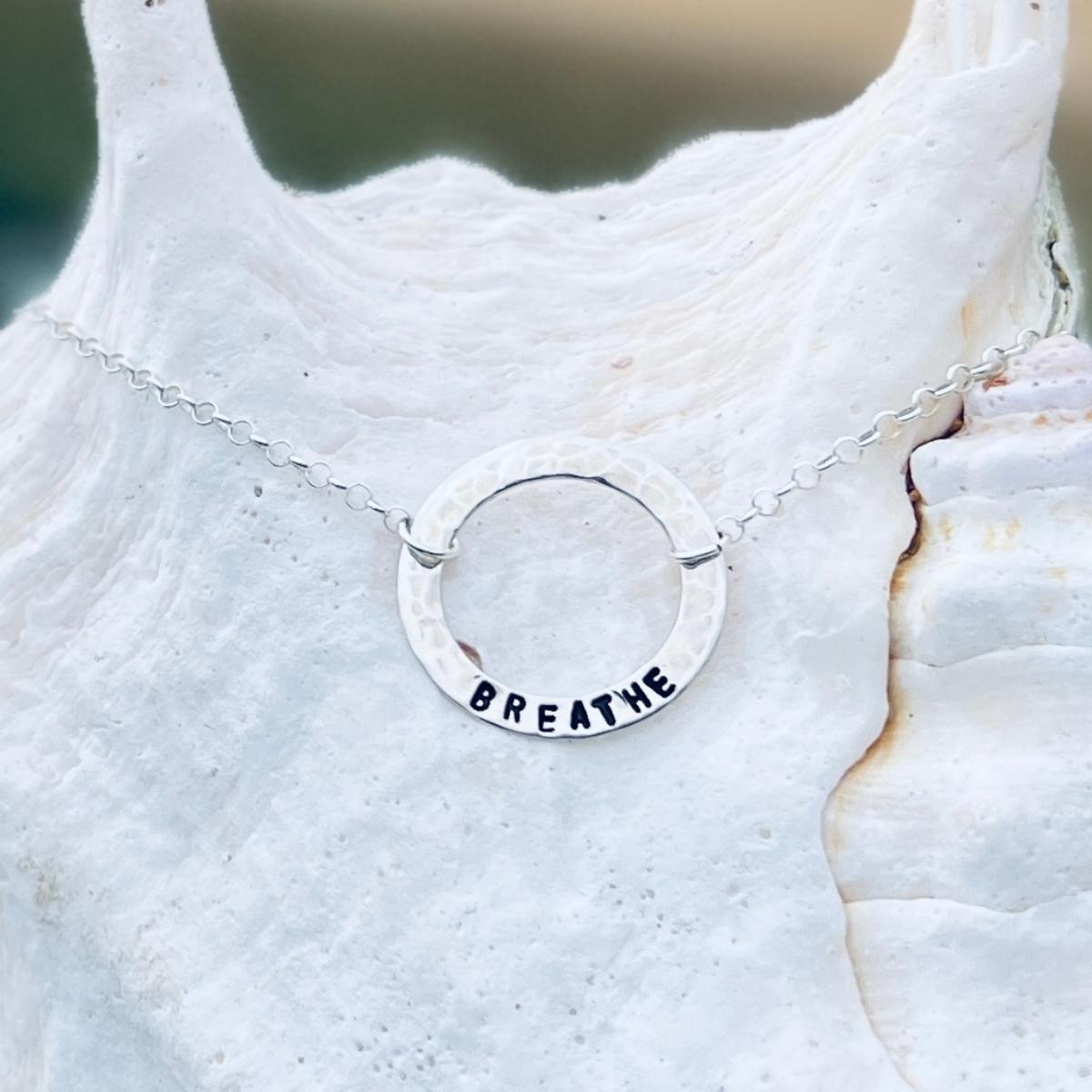 Sterling Silver Infinity Circle Necklace with a hand stamped reminder to BREATHE.
