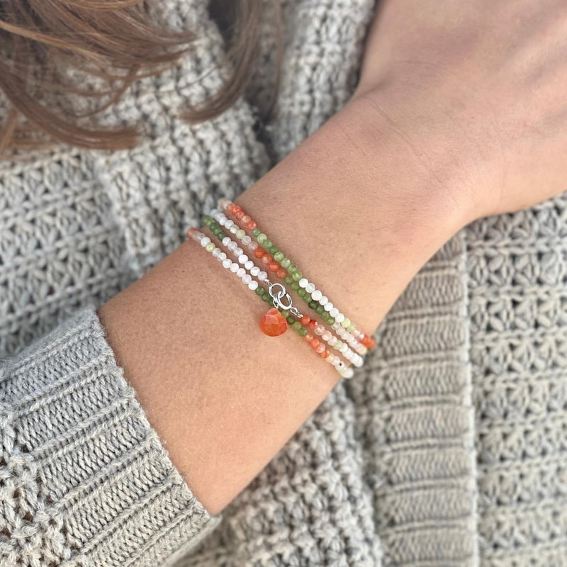Keeper of Positivity Wrap Bracelet with Carnelian, Olive Quartz and Moonstone. Positive thinking is all about anticipating happiness, health and success instead of expecting the worst. Leveraging the law of attraction, this mindset creates a positive feedback loop that brings even more good into your life.