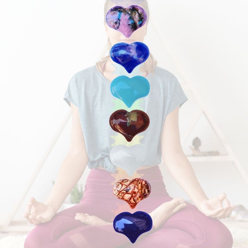 Unique and genuine heart shaped gemstones. Set of 7 chakra stones, Metaphysical Crystals that help you connect with your chakras. This set includes  the following 7 heart shaped gemstones:  Rhodonite, Sodalite, Amazonite, Dragon Blood, White Jade, Leopard Jasper, Purple-Blue Golden Sandstone.