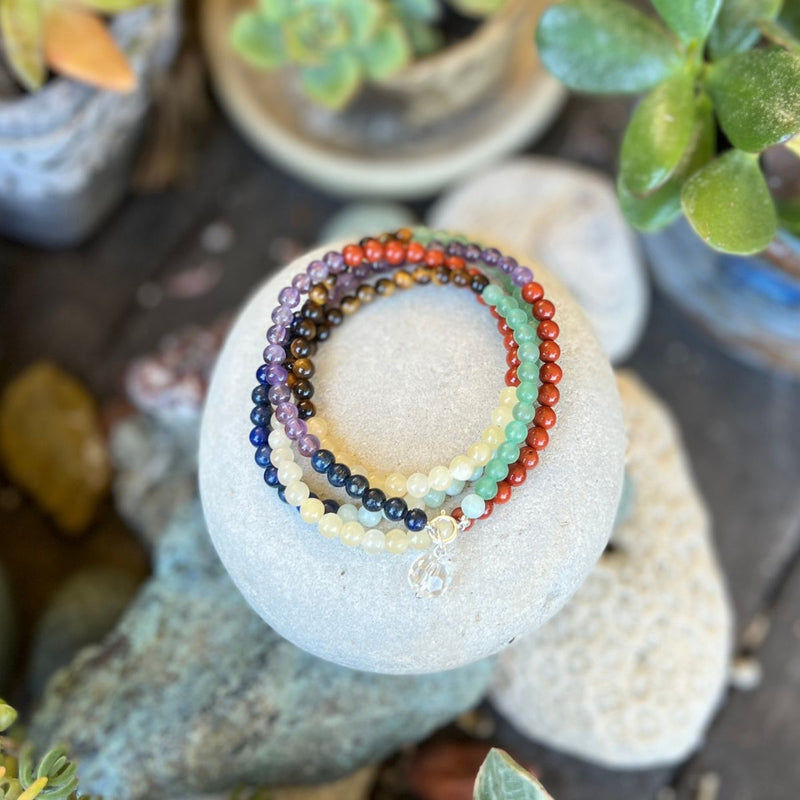 The chakras, or energy points, that exist within each of us, guide us as we come into our spiritual power. This Flowing Energy Chakra Wrap Bracelet helps you align your chakras and enables a continuous energy flow.  