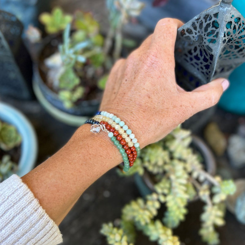 The chakras, or energy points, that exist within each of us, guide us as we come into our spiritual power. This Flowing Energy Chakra Wrap Bracelet helps you align your chakras and enables a continuous energy flow.  