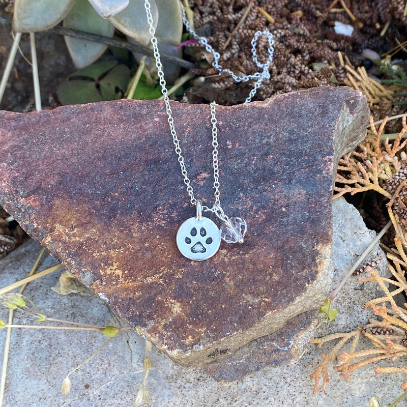 Wear this Dog Paw Charm Necklace to Celebrate Unconditional Love. Dogs are spiritual beings. Their free-spirited energy is pure and divine. Dogs love and accept us unconditionally.  I believe dogs are on this earth to teach humans lessons about love, life, loss, grace and spirituality. We all know dogs heal us ;-)