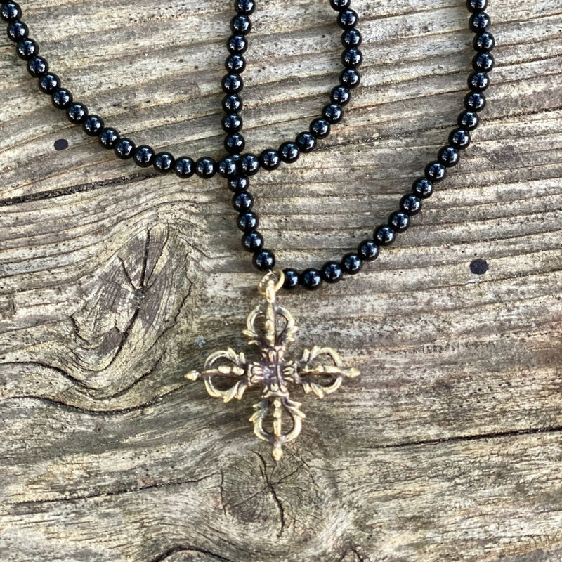 Dorje Necklace - Symbol of Enlightenment. Dorje conveys the compassion that leads one to relief of suffering, the elimination of ignorance and ultimately enlightenment. 