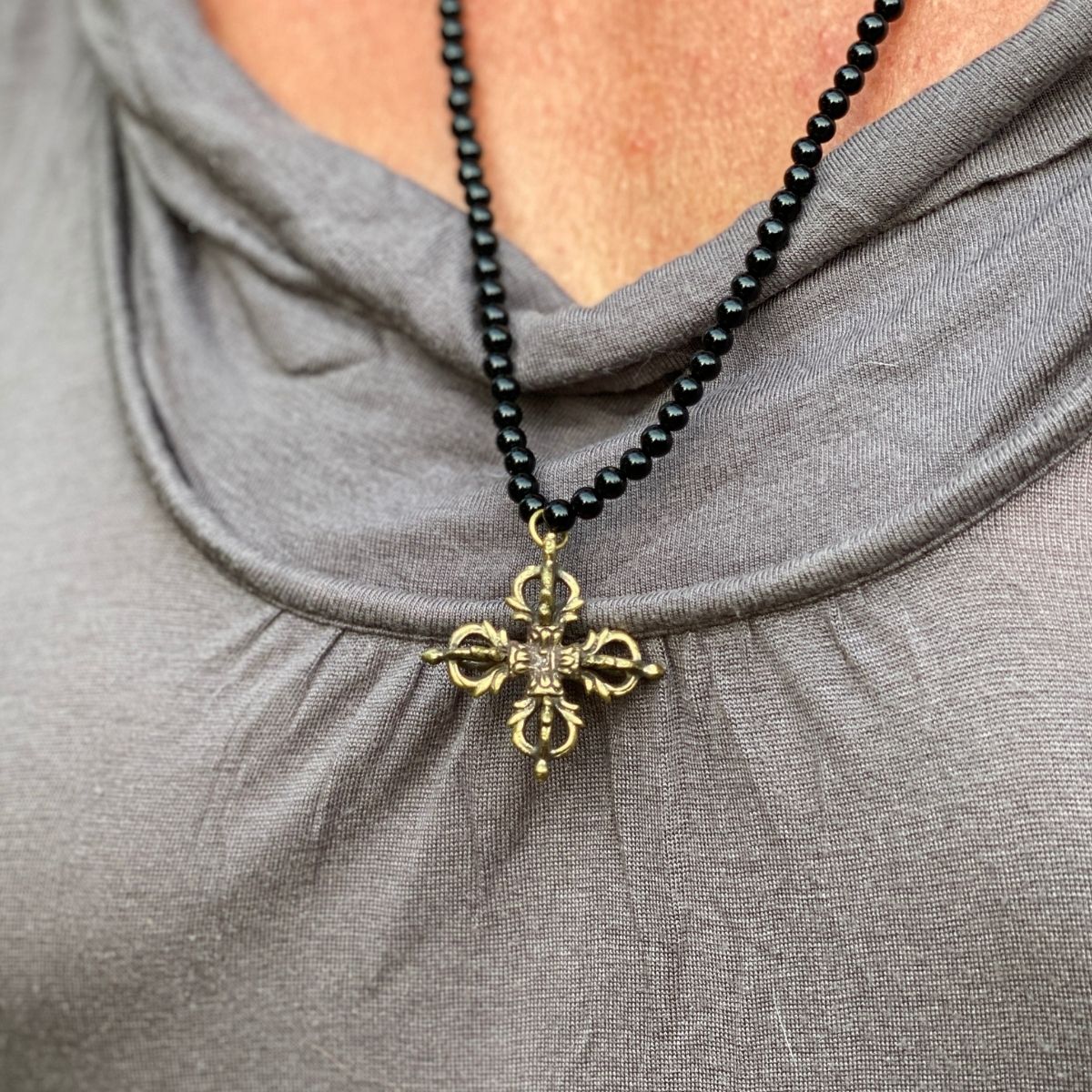 Dorje Necklace - Symbol of Enlightenment. Dorje conveys the compassion that leads one to relief of suffering, the elimination of ignorance and ultimately enlightenment. 