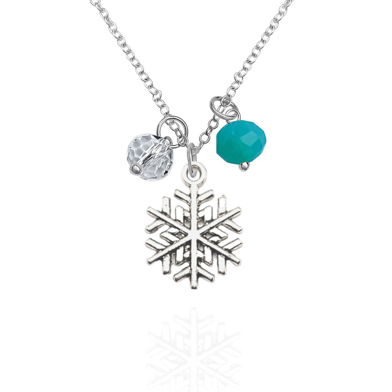 Holiday Harmony Necklace with Snowflake and  Crystal Charms. The perfect piece of jewelry to bring you into the Holiday Spirit.  According to an ancient Zen proverb “A snowflake never falls in the wrong place.” The beauty of snowflakes, they have hypnotizing silhouettes.