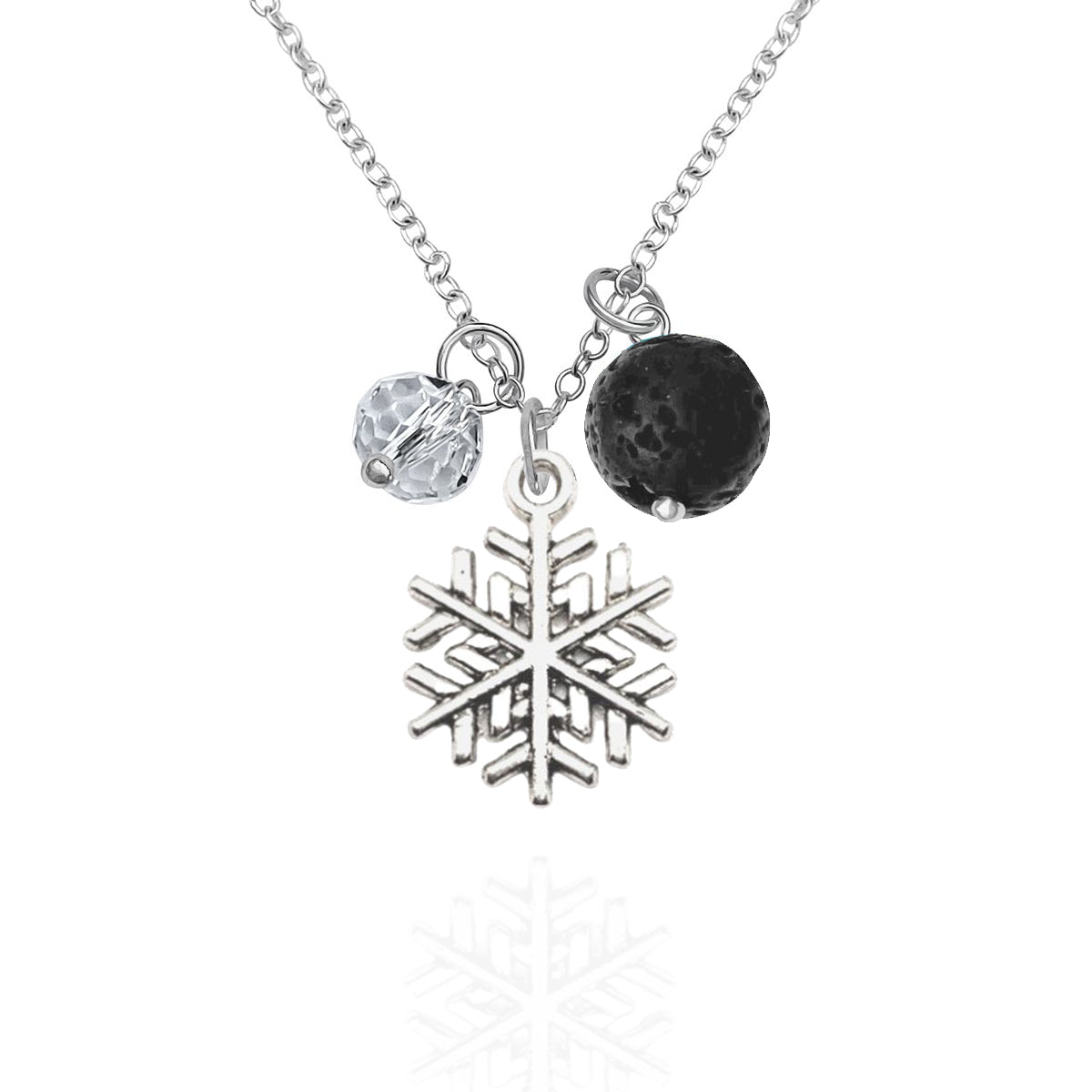 Holiday Harmony Necklace with Snowflake, Lava Stone and Clear Crystal for Aroma Therapy and Chi. The perfect piece of jewelry to bring you into the Holiday Spirit.  According to an ancient Zen proverb “A snowflake never falls in the wrong place.” The beauty of snowflakes, they have hypnotizing silhouettes.