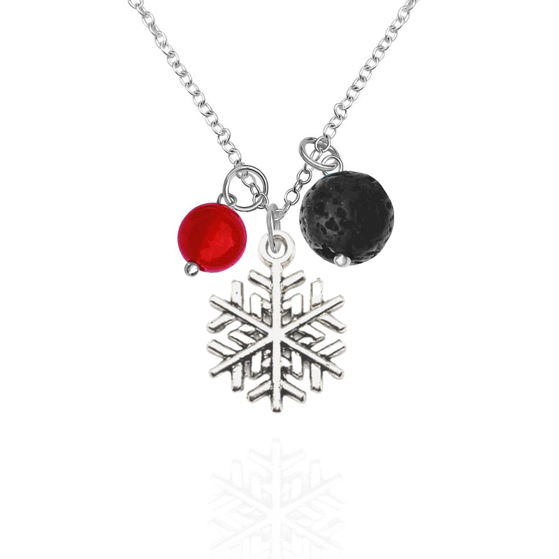 Holiday Harmony Necklace with Snowflake, Lava Stone and Red Jade for Aroma Therapy and Chi. The perfect piece of jewelry to bring you into the Holiday Spirit.  According to an ancient Zen proverb “A snowflake never falls in the wrong place.” The beauty of snowflakes, they have hypnotizing silhouettes.