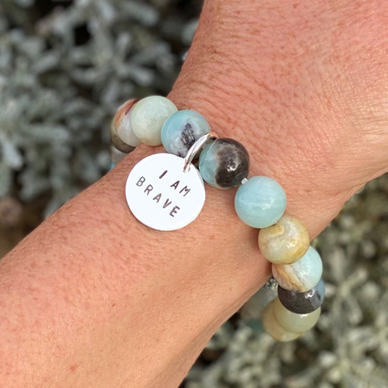 I am Brave Affirmation Bracelet with Amazonite for Courage.  Repeat the "I am Brave" affirmation every morning during your routine! This will set the intention for the rest of your day  (and perhaps life) - to travel into the unknown to try something new.