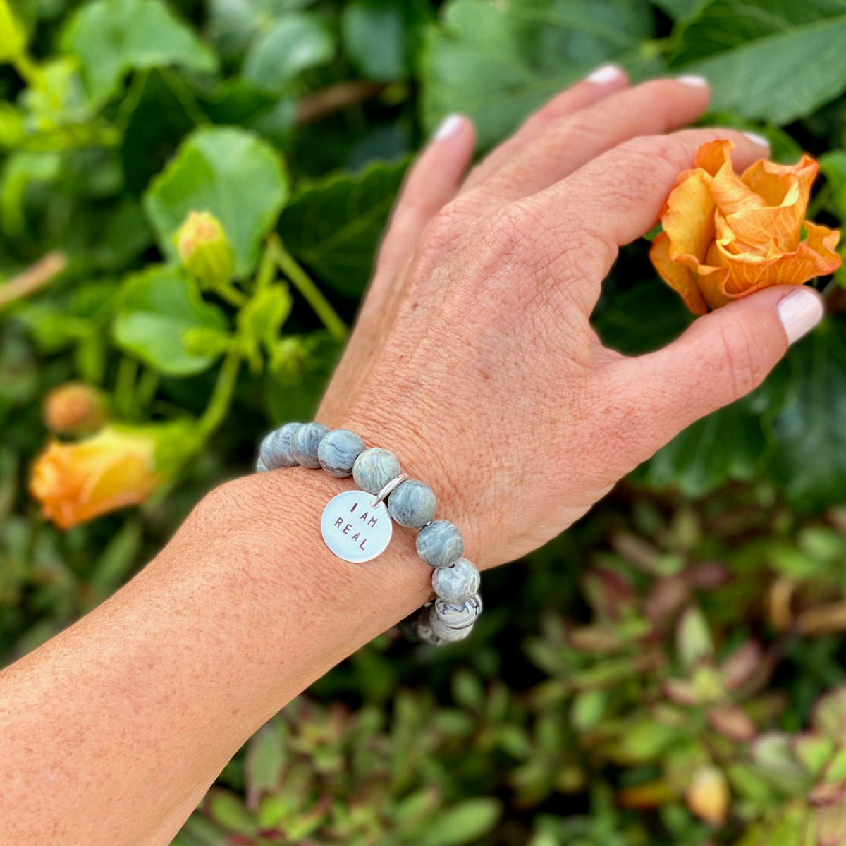 I am Real Affirmation Bracelet with Jasper to Help Stabilize your Mood Swings. "To be yourself in a world that is constantly trying to make you something else is the greatest accomplishment." Ralph Waldo Emerson. Trying to please EVERYONE is a recipe for frustration. Be yourself, be real and you will be happier.