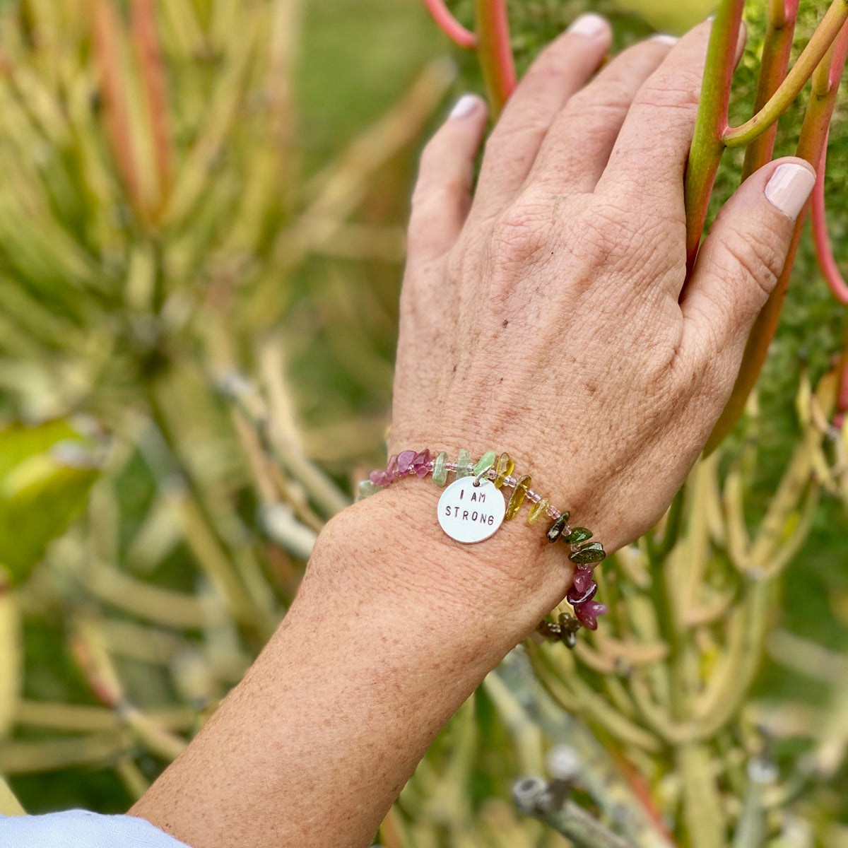 I am Strong Affirmation Bracelet with Tourmaline to Help Achieve Success. “I am” statements formulate, affirm, and perpetuate the stories you tell yourself. Stories about who you are, who you can be, and what you can do. Every “I am” is true, if you repeat it enough. 