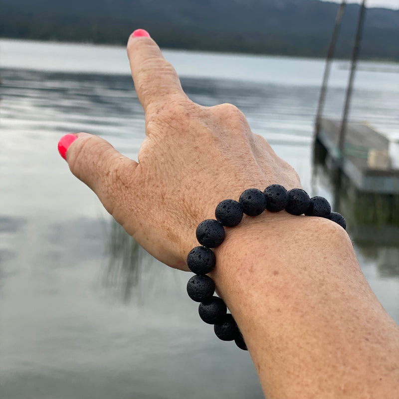 Lava Stone Bracelet for Calming Emotions.. Our Mindfulness Jewelry is designed with traditional methods, minding chakras and healing. Lava stone is excellent for calming emotions thanks to its grounding qualities. Great accessory for Aroma Therapy. Holds essential oils for 8 hours.