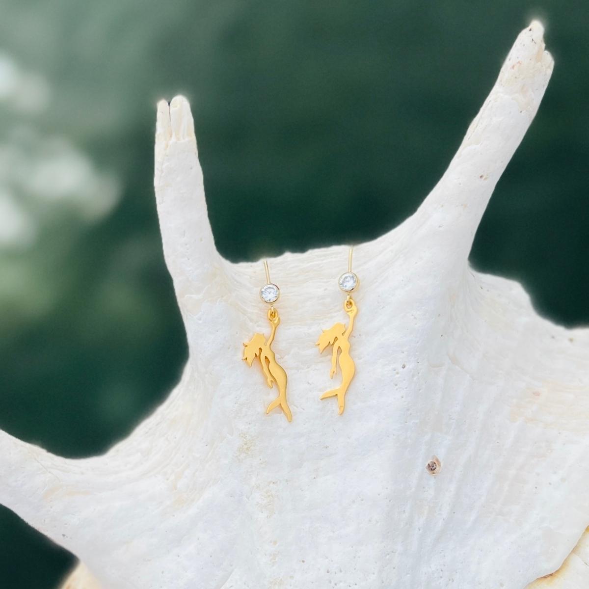 Gold Filled Miss Scuba Mermaid Earrings with Sparkly CZ Crystal This piece reflects Miss Scuba's sense of mystery and individuality, and beckons the free spirit in every self-made women.  Mermaids symbolize Love, Beauty, Mystery, Untamed Spirit and Femininity.