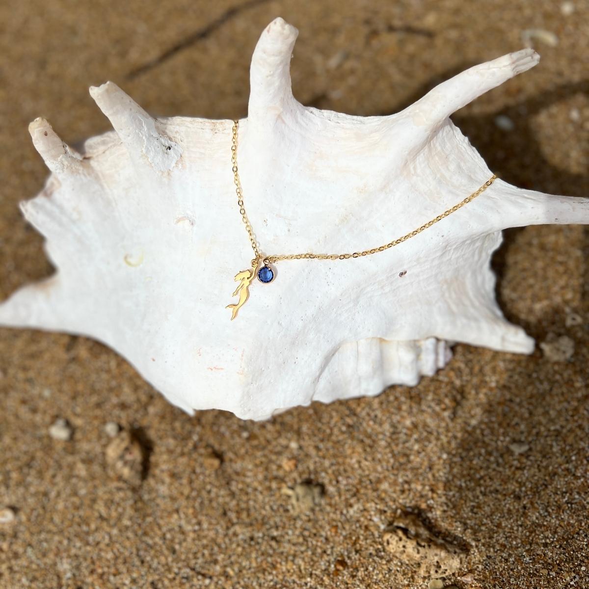 Miss Scuba Mermaid Necklace with Swarovski Crystal, Gold Filled over Sterling Silver This piece reflects Miss Scuba's sense of mystery and individuality, and beckons the free spirit in every self-made women.  Mermaids symbolize Love, Beauty, Mystery, Untamed Spirit and Femininity.