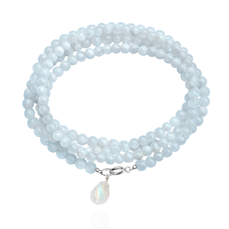 Moonstone Wrap Bracelet to invite New Beginnings. A stone for “new beginnings”, Moonstone is a stone of inner growth and strength.  Moonstone calms and encourages, teaching us the natural rhythms of life. Moonstones have an association with the Crown Chakra and our spiritual center. 
