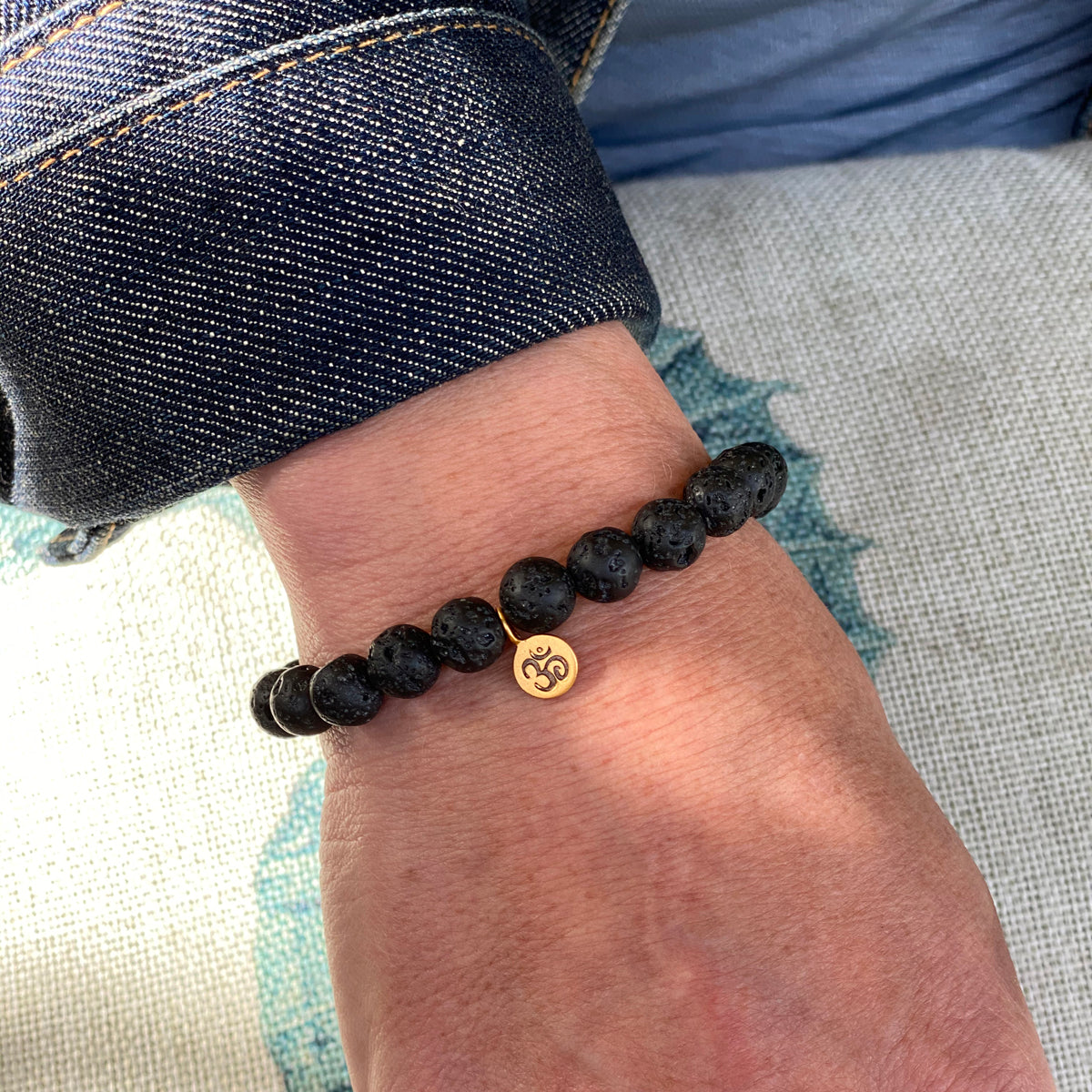 Yoga Inspired Lava Stone Bracelet with Ohm Charm to Hear the Sound of the Universe
