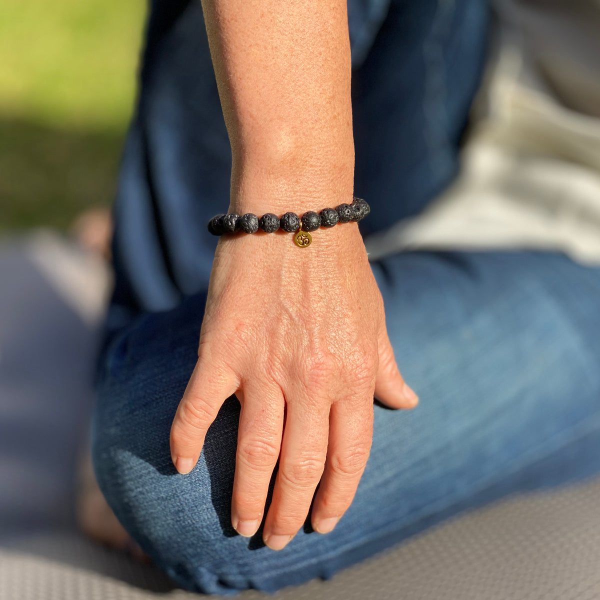 Yoga Inspired Lava Stone Bracelet with Ohm Charm to Hear the Sound of the Universe