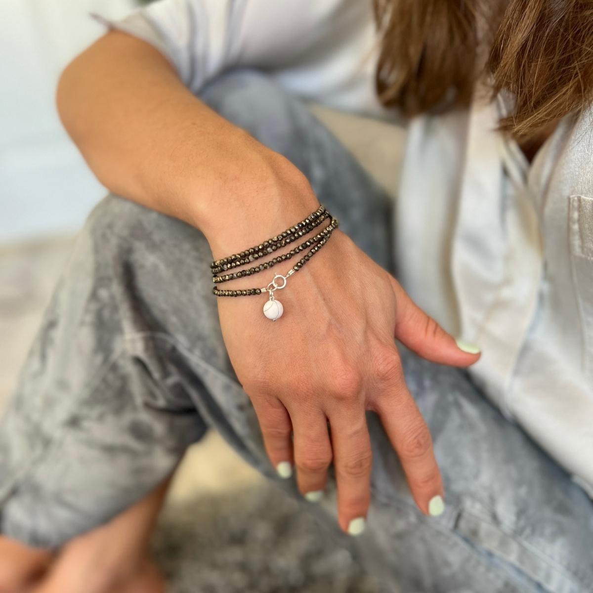 Attract Abundance Wrap Bracelet with Pyrite. Pyrite is a potent stone when it comes to cultivating abundance and prosperity. Howlite strengthens memory and stimulates desire for knowledge. It teaches patience and helps to eliminate rage, pain and stress.