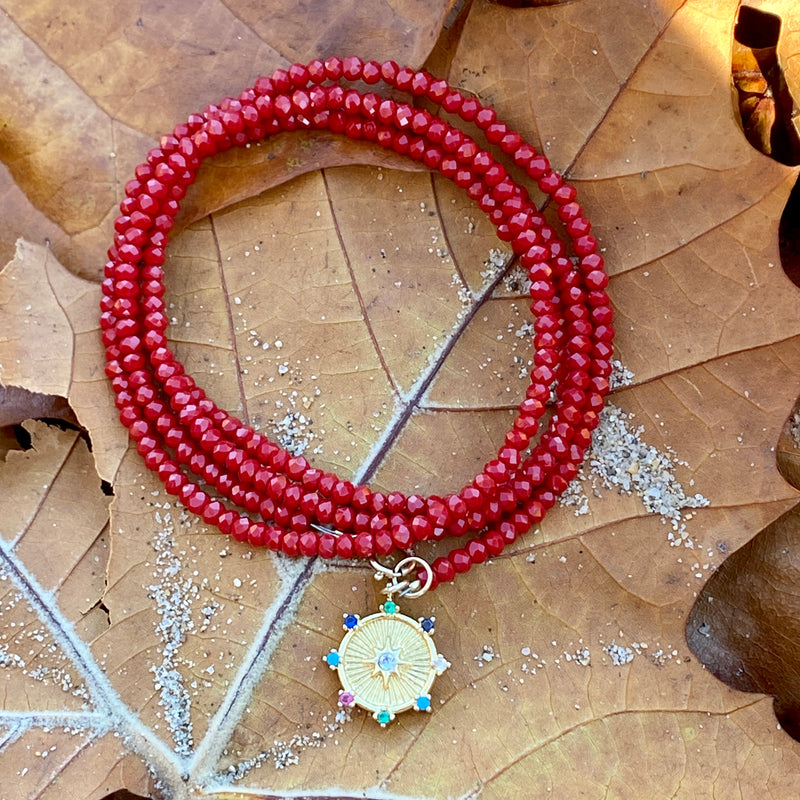 Burgundy Red Crystal Wrap Bracelet with The Medicine Wheel to Restore Harmony in Your Life. The Medicine Wheel is an ancient Indian practice of balance and harmony within the Four Directions. A Healing Journey that can restore Wholeness and Connection to Ourselves and to the World.