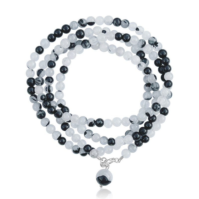 A bracelet made of Rutilated Quartz that encourages us to getting out of our comfort zone. This Limitless Living Wrap Bracelet reflects the stone's ability to promote self-realization, self-discovery, and wisdom, helping us to accept challenges and move beyond our limits to live a limitless life.