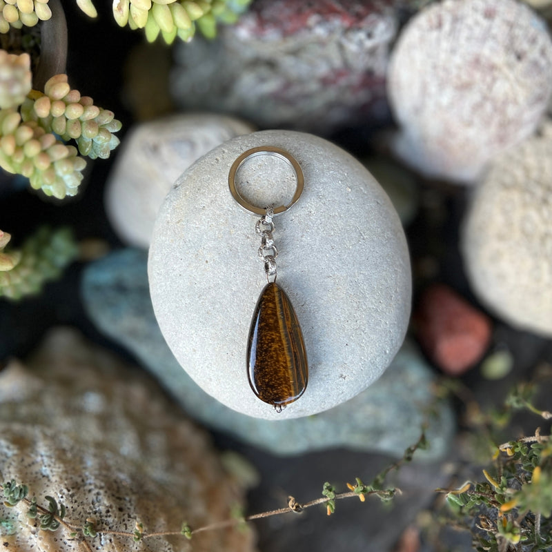 Get Grounded Tiger Eye Keychain: Think of the qualities of the Tiger. Patient, focused, determined, alert, with perfect timing and slow, deliberate action. This is Tiger Eye’s gift to you. It is a healing stone that promotes the balance and strength needed to get through difficult phases of life.