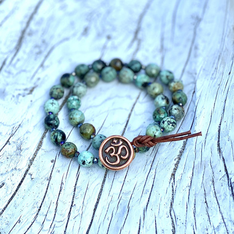 Unisex Turquoise Wrap Bracelet with an Ohm button to Promote Self-Realization from Gogh jewelry Design