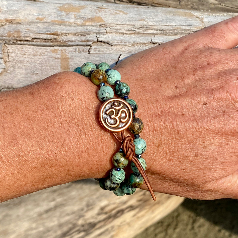 Unisex Turquoise Wrap Bracelet with an Ohm button to Promote Self-Realization from Gogh jewelry Design