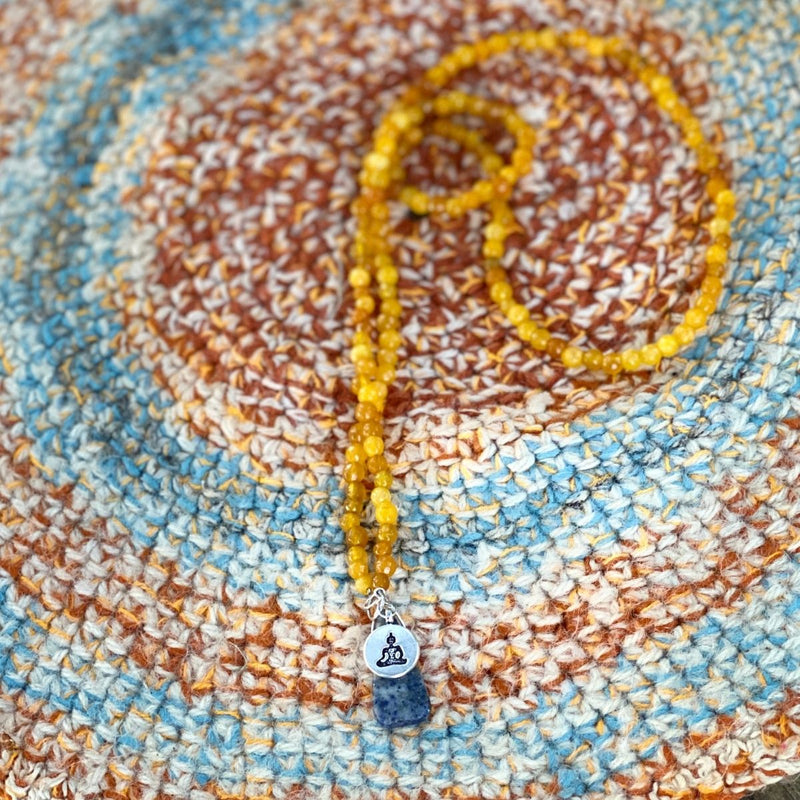 Meditating Yogi Necklace with Jade and Lapis Lazuli to open the mind to all possibilities.