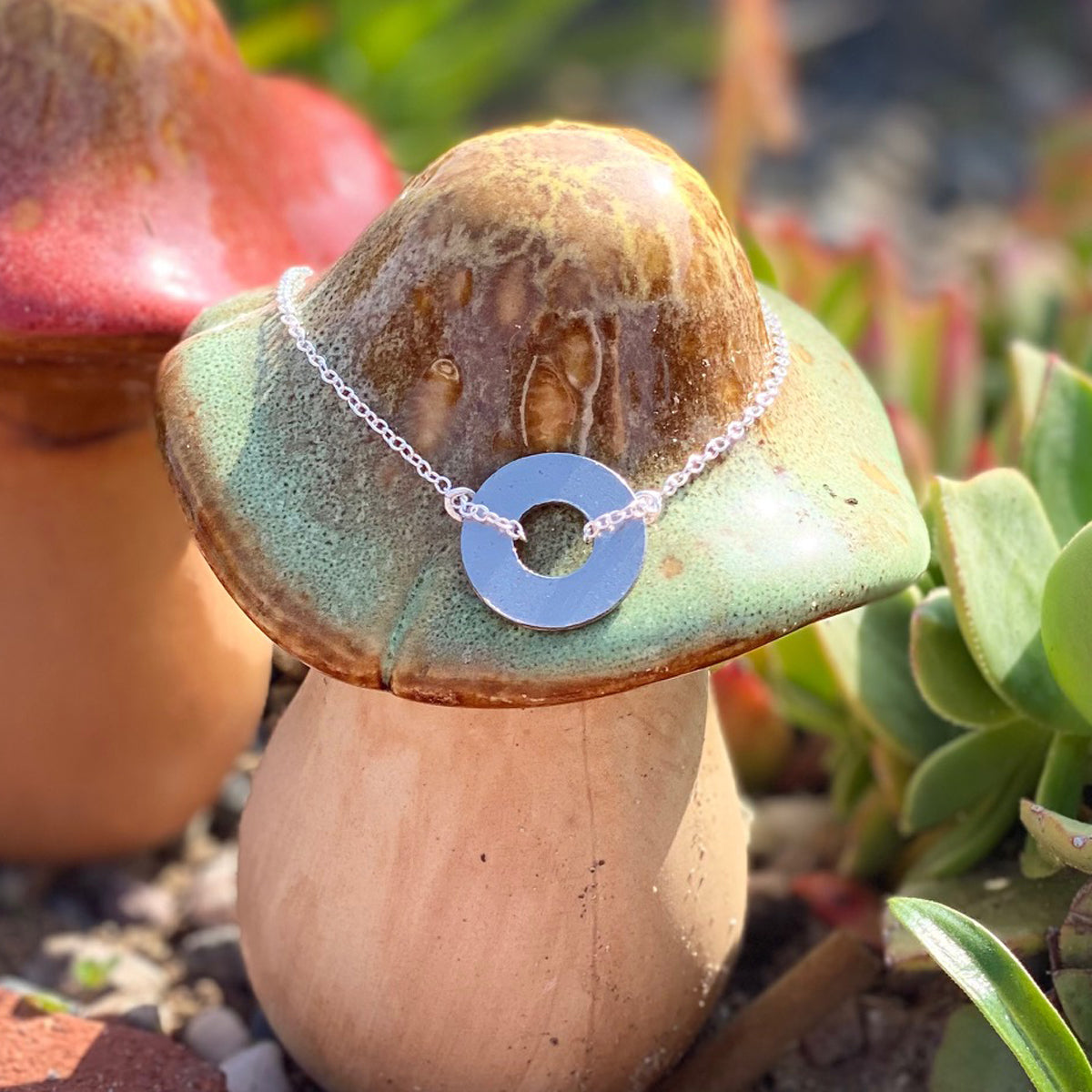 Earth Love - Zero Waste Necklace for Conscious Eco Living with Upcycled Scuba Gear washer.  Influenced by those artists and organizations that up-recycle fishing nets into bathing suits from ocean trash. Eco-conscious jewelry for the ocean lovers, surfers, scuba divers.