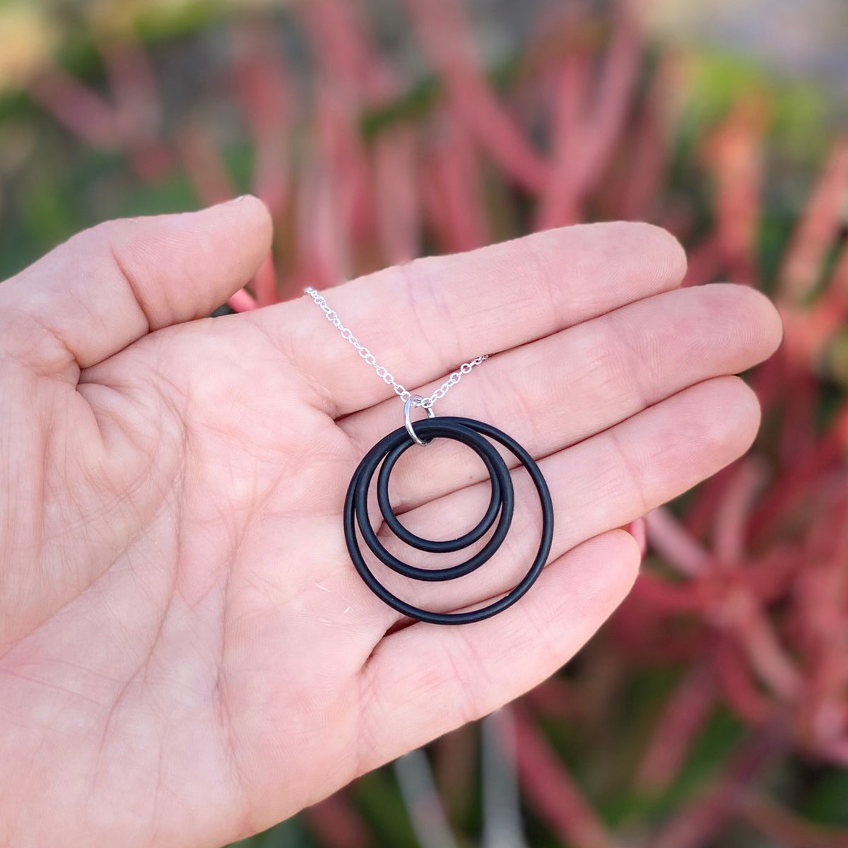 Zero Waste Necklace for Conscious Eco Living from recycled scuba gear